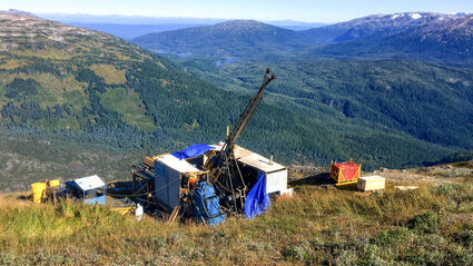 A drill tests for gold-silver mineralization on a mountain saddle at Homestake.