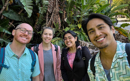 Four UBC graduate students taking selfie during research trip to Australia.