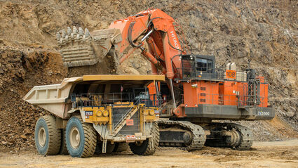 Excavator loading ore into haul truck at Kinross Alaska’s Fort Knox gold mine.