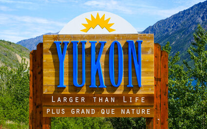 The welcome sign between the Alaska and Yukon Territory border.