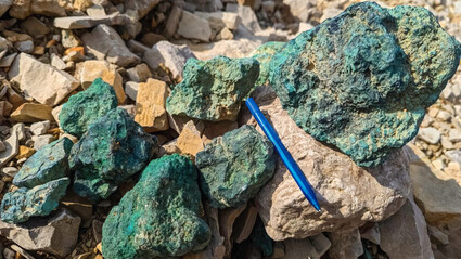 Rocks from the Storm project in Nunavut stained green from copper oxidization.