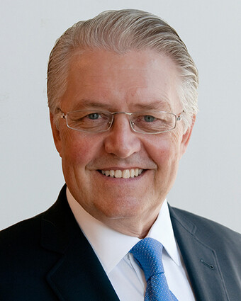 Head and shoulders photo of Northern Dynasty Minerals CEO Ron Thiessen.