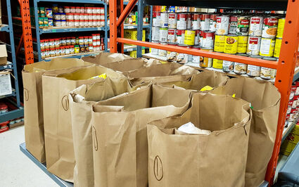 Sacks of groceries by Food Bank Society of Whitehorse Victoria Gold donation
